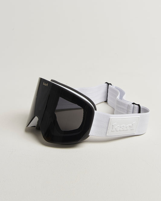 White ski goggles with black lens side view